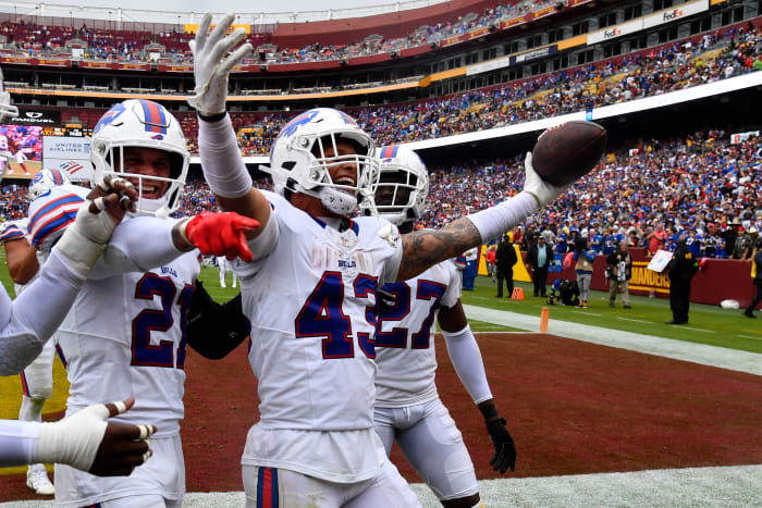 Buffalo Bills linebacker Terrel Bernard (43) celebrates with teammates after recovering a fumble against the Washington Commanders during the second half at FedExField.